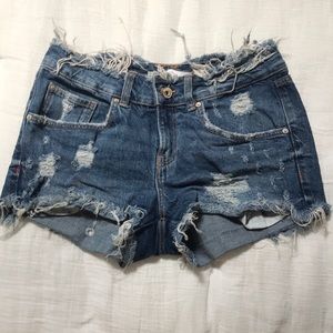 Distressed denim shorts